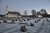 Bøhaugen Bø kyrkje gamlekyrkja vinter blått lys rim frost vinterstemning monument gravsteinar minnelund utsikt bø sentrum