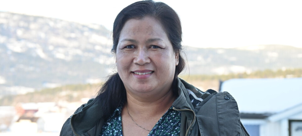 Meena har blitt bøhering, men ofrar til Buddah kvar dag