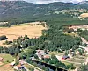 SETT FRÅ LUFTA: Bildet av dette området i Midt-Telemark er tatt for fleire tiår sidan.